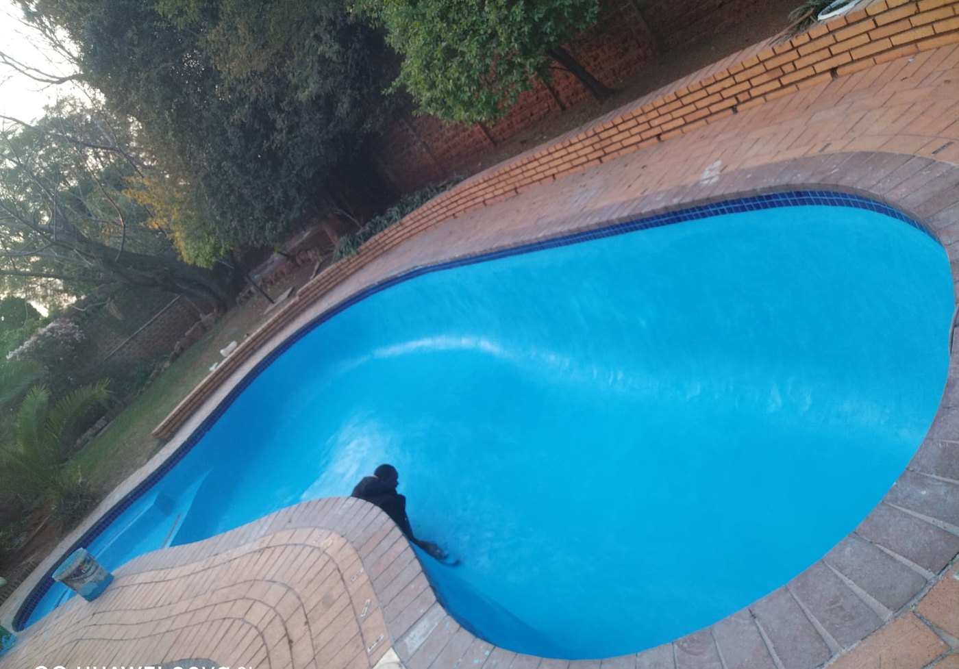 Renovated blue swimming pool